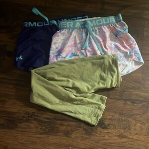 Girls bundle 2 pair of under armour shorts. 1 pair of Nike leggings